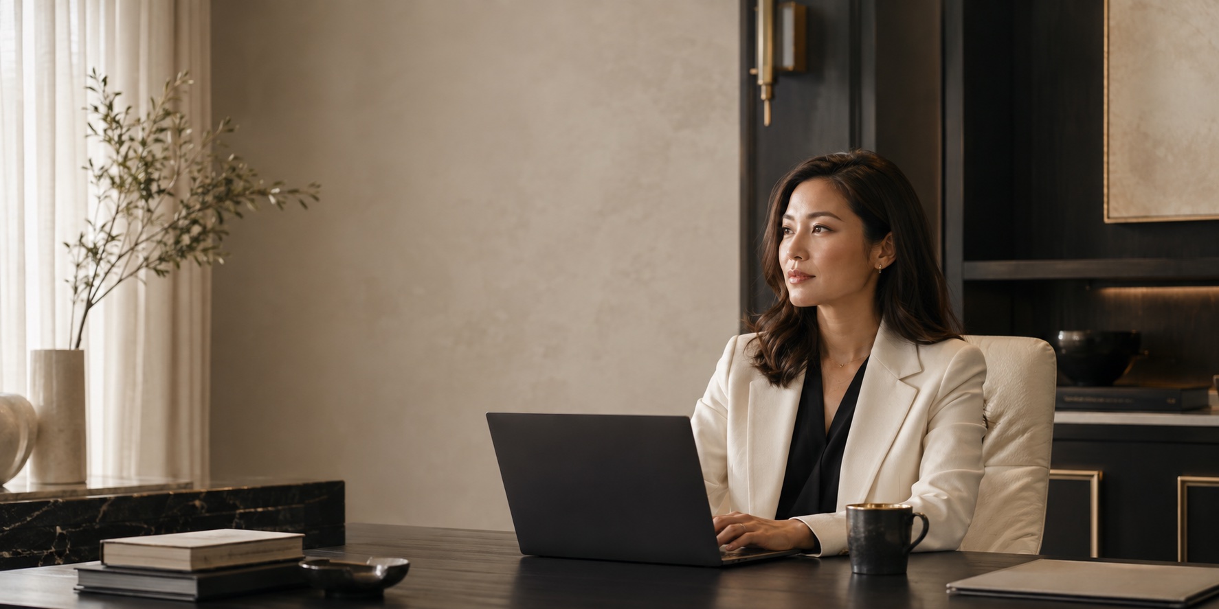 A business professional working in an elegant modern office